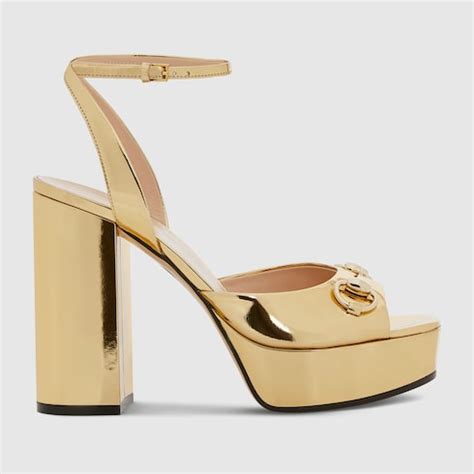 Women's Horsebit platform sandal in metallic light gold leather